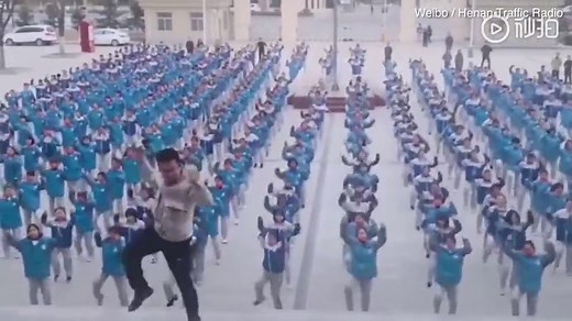 Chinese teacher leads hundreds of pupils to dance viral salsa routine