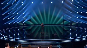 Jeffrey Li, a 13-year-old, performs Whitney Houston's "One Moment in Time." | Buzz Music World