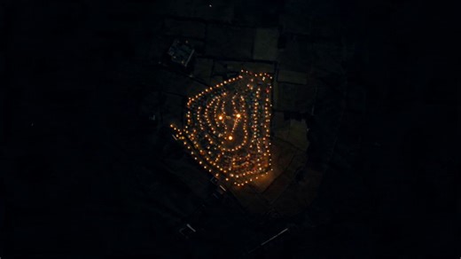 A highly dynamic continuous 15-second single-take in a rural Egyptian festival, 1960, no electricity, only lanterns and bonfires, same environment and characters[0–5s]: High aerial shot spiraling downward in a circular orbit around the glowing festival, revealing crowd density and tents[5–10s]: Camera breaks orbit into fast forward glide through crowd, passing Ferris wheel and Ghaziya dancer spinning[10–15s]: Low sweep past food stalls → lion cage → whip-pan to mayor firing rifle#Seedance2 @flor
