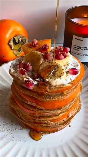 Dreamy Vegan Recipes on Instagram: "Persimmon Pancakes ✨🥞🤎 Persimmon is in season now and keep seeing so many desserts featuring it. If you love persimmon - you got to try these amazing pancakes 🥞 Crispy on the outside, soft and fruity inside — no banana, no eggs, just pure autumn magic! ✨🧡 Topped with dairy-free yogurt, fresh fruit & a drizzle of maple syrup 🥰 Ingredients: for 8 pancakes 2 persimmons ( I used 1,5 and then other half for decoration) 80g flour 1/2tsp cinnamon ( or 1 if you l