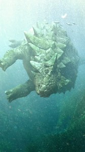 Ankylosaurus was a heavily armored dinosaur that roamed North America around 68 to 66 million years ago, during the late Cretaceous period. Growing up to 30 feet long and weighing around 4 tons, this plant-eater had thick, bony plates along its back, providing strong protection from predators like Tyrannosaurus rex. One of its most striking features was the large club at the end of its tail, which it could swing with force to defend itself. This powerful tail could break the bones of attackers,