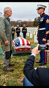 HE INTERRUPTED A MILITARY FUNERAL—AND EVERY MARINE FOLLOWED HIM INTO THE CEMETERY Nobody saw him at first. Just an old man in faded green coveralls, limping through Arlington like he belonged to the earth itself. His boots were worn to the sole. His gaze? Sharper than the rifles lined up to salute the dead. He looked like a groundskeeper. But he moved like a man on a mission. The funeral had already begun—polished boots, white gloves, a flag folded so tight it might as well have been prayer. A w