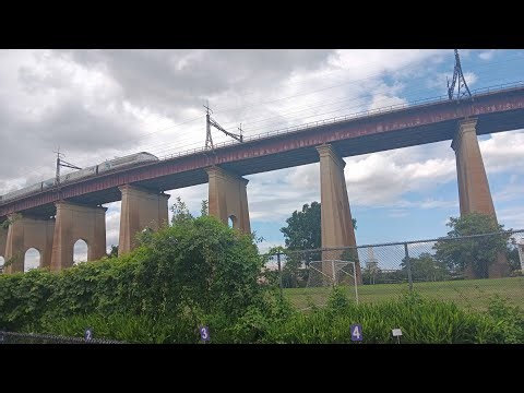 Amtrak Trains crossing the Hell Gate Bridge