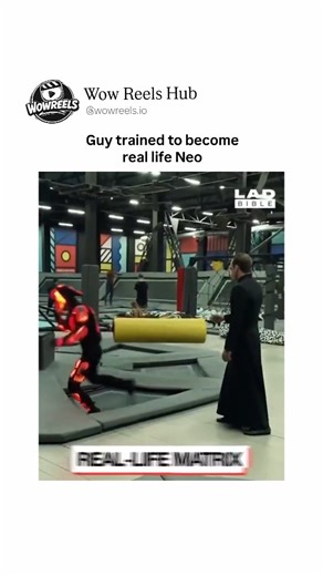 Wow Reels Hub™ on Instagram: "The video opens in a vibrant indoor trampoline park, where a performer dressed in a black trench coat, resembling Agent Smith from The Matrix, confronts another in a glowing red-lit suit akin to Neo. The "Neo" character demonstrates impressive agility, leaping and bending backward on the bouncy surfaces to dodge yellow foam logs hurled at him. Overlaid text proclaims "REAL-LIFE MATRIX," emphasizing the recreation of the film's iconic bullet-time dodging scene, compl