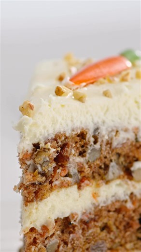 15K views · 135 reactions | 凌 Our Ultimate Carrot Cake is the perfect way to welcome spring! With three layers of moist, spiced cake packed with shredded carrots, walnuts, and raisins, all topped with smooth cream cheese icing, it’s no wonder this treat is a family favorite.  Chef Tip: Serve at room temperature to bring out the best flavor! #Wegmans #CarrotCake --- Featured Product: Wegmans Ultimate Carrot Cake | Wegmans | Facebook
