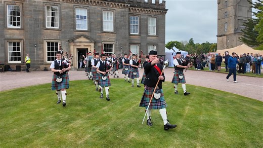 Strathisla Pipe Band march off after their display by Gordon Castle during the 2025 Gordon Castle Estate Highland Games and Country Fair. This was held on Sunday 18th May 2025 within the Estate at Fochabers in Moray, Scotland, and the band were playing the tunes Lord Lovat's Lament and We’re No Awa’ tae Bide Awa. #gordoncastle #marchingband #strathislapipeband | Scotland Online