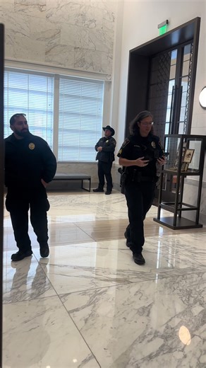 Not a single Fire Marshal in sight when I got to the meeting but then the whole pack shows up. McBride was actually wearing her body camera this time while double fisting her phones. #dallas #county #police #marshal #ungovernable