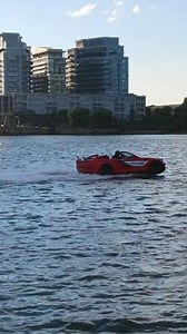 An amphibious car, also known as an amphibious vehicle, is a type of vehicle that is designed to travel both on land and in water. These vehicles typically have features such as waterproof seals, buoyant materials, and propellers or jet drives that enable them to move seamlessly between different environments. Amphibious cars often have a rugged, off-road design to handle various terrains on land, and they may also feature retractable wheels or hulls to transition from land to water. Some models