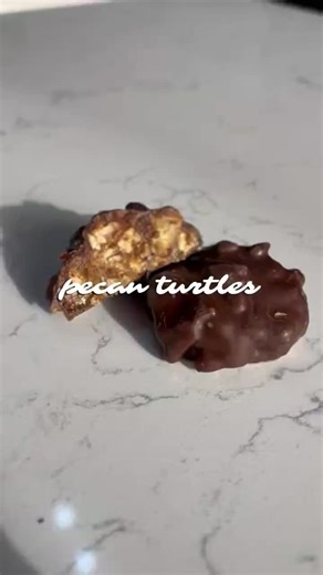 —— Pecan Turtles 🐢 golden toasted pecans folded into a soft, buttery caramel, topped with a layer of rich chocolate @azucarbymaysoon #chocolateturtle #pecan