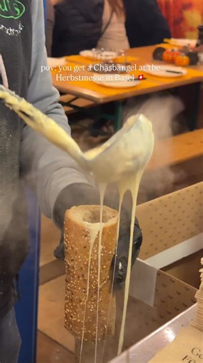 187K views · 1K reactions | It’s a tradition: getting a Chäsbängel every year during the Herbstmesse. For newbies: it’s a baguette filled with melting cheese aka fondue-on-the-go. I remember the first time I tried it: I burned my hand, my tongue and had cheese all over me (it was still worth it! ). Now I eat like a pro . Save it for your Basler bucket-list! #basel #switzerland #schweiz | Girl in Basel | Facebook