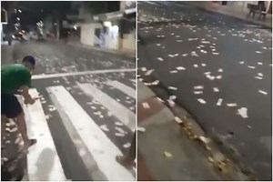 Brazen gun battle in Brazil bank heist leaves cash scattered on road