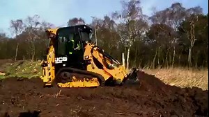 The 1CXT is a versatile backhoe loader, with excellent material handling and excavating capabilities, in a compact machine with the footprint, versatility and maneuverability that many associate with a compact track loader. | JCB