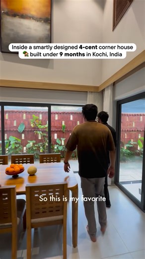 ArchPro on Instagram: "Built on a tight 4-cent corner plot in Kochi, this residence is a response to extreme spatial constraints and local setback regulations. With only a narrow footprint to work with, the design team saw an opportunity—not a limitation—to explore how tropical modernism could thrive in dense urban conditions. Completed in just 9 months, the two-storey home maximizes space through vertical layering and strategic cantilevers that reclaim volume lost to setbacks. Floating upper fl