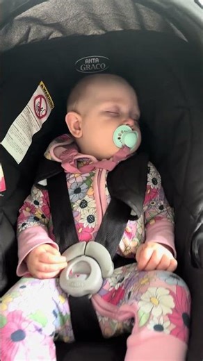 baby kayla sleeping in her car seat 😴 cutest little nap
