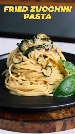 SPAGHETTI ALLA NERANO 😍 Simple fried zucchini, fresh basil, and creamy cheese come together to make magic... proof that when Italians cook with love, even humble ingredients can taste extraordinary. It’s light, creamy, and bursting with flavor… and all that’s missing is the view of the Mediterranean. Get the full recipe here → https://www.vincenzosplate.com/fried-zucchini-pasta/ | Vincenzo's Plate