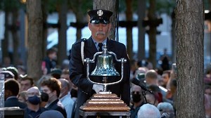 A minute's silence has been held in New York to mark the moment the first plane struck the North Tower of the World Trade Center.