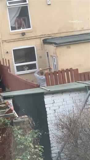 Angry UK neighbours clash in viral 'plank wars' video