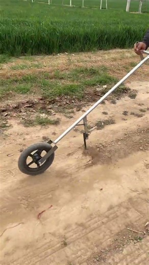 Efficient Farming Aid: Hand-Pushed Gutter Tool Magic