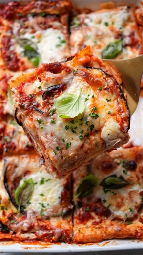 ✨ When you can’t decide between eggplant parm and lasagna✨ Roasted eggplant lasagna layered with marinara, ricotta, smoked scamorza and mozzarella. So cozy and delish on a cold winter day🍝 Full recipe at the link in my bio! Ingredients: Quick Marinara Sauce: - 2 tbsp. extra virgin olive oil - 4 garlic cloves, minced - 14 oz. crushed tomatoes - Salt to taste - 1 sprig fresh basil Lasagna: - 6 no-boil lasagna sheets (or enough for 3 layers) - 2 large eggplants, sliced lengthwise 1/4 inch thick - 