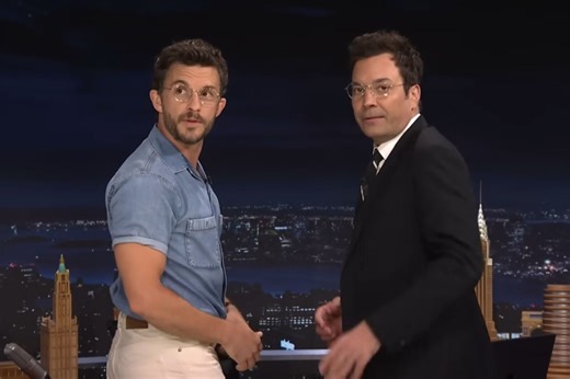 Jonathan Bailey leans in to kiss Jimmy Fallon during 'slutty little glasses' segment: 'Too easy!'