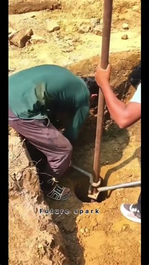 Manual Soil Drilling: How Workers Dig Deep Holes Using a Simple Tool