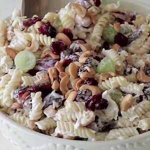 921K views · 107 reactions | Cashew Chicken Rotini Salad ~ Loaded with Cashews, Grapes, Chicken, Pasta and Dried Cranberries! Perfect Pasta Salad Recipe for the Summer! RECIPE HERE --> https://www.julieseatsandtreats.com/cashew-chicken-rotini-salad | Julie's Eats & Treats - Easy, Family Friendly Recipes | Facebook