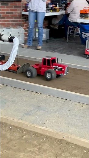Big 4wd Massey Ferguson RC tractor struggles pulling the heavy sled
