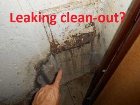 Leaking chimney door in basement. Fireplace cleanout dripping water