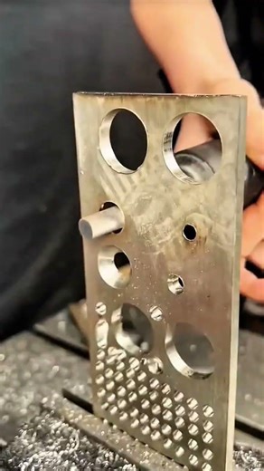 Grinding metal bearing surface with rotary burr tool