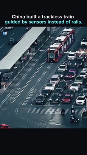 The Unfold (Global 🌎) on Instagram: "China's technology..... This video shows China’s Autonomous Rail Rapid Transit system, a trackless train that follows virtual rails painted on city roads instead of steel tracks. Using optical and LiDAR sensors, the vehicle reads guidance markings in real time and adjusts steering, acceleration, and braking automatically. The result is tram-like precision without the cost and rigidity of traditional rail infrastructure. Because it runs on rubber tires and el