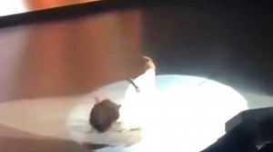 Oprah falls on stage