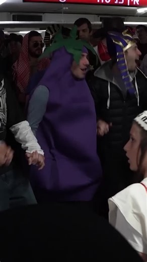 People celebrated the Jewish holiday of Purim in an underground parking garage turned bomb shelter in the Israeli city of Tel Aviv. | Reuters