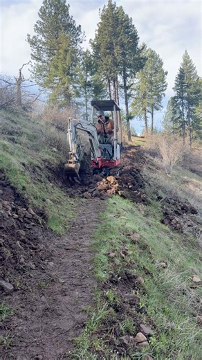 Digging trail with our (new-to-us) Takeuchi TB108