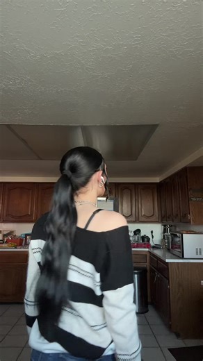 Captivating Jet Black Hair and Green Eyes