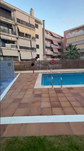Kid Misses Pool Jump, Lands On Edge