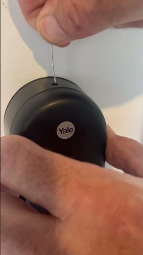 How to open the battery compartment of a Yale keyless front door lock.