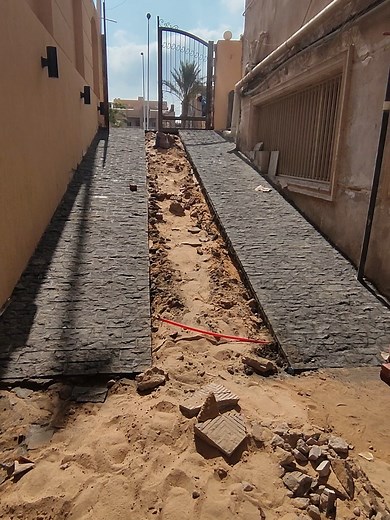 أعمال تجهيز رامب نزول سيارات بالبازلت