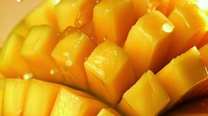 Super slow motion juicy mango. High quality FullHD footage