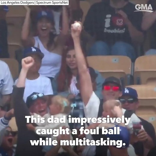 Dad makes unbelievable foul ball catch at the Dodgers game holding a baby and a beer l GMA
