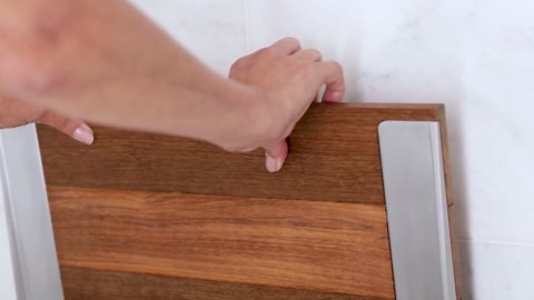 Check The Home Depot's Q&A Before Buying: SEACHROME SlimLine Natural Teak Wood Wall Mount Folding Shower Seat Bench with Matte Black Frame