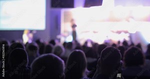 Listening to the speech about marketing and management of company for successful sales. Talk about politics and finance.