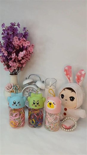 Tiny, cute, and colorful.The sweetest way to keep your hair ties organized ✨ #goher #viral #ytshorts