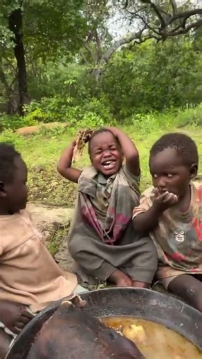 Two children fighting over food #youtubeshorts #africa #cooking #viral #shorts #food #funny #baby