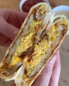 9.2K views · 99 reactions | Start your day off with a crunch. Claire G. takes full advantage of the searing action in our Ninja™ Foodi™ NeverStick™ Cookware (after preheating their pan for at least a few minutes) to make a crunchy, gooey breakfast crunchwrap. What would you put in? https://bit.ly/3cB93nx | Ninja Kitchen | Facebook