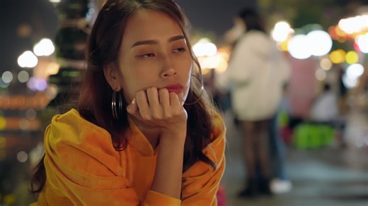 Young Vietnamese woman staring gawking at the side of the street | Premium Stock Video Footage