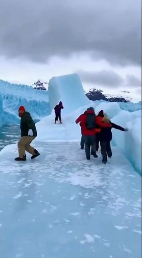 Ice Shelf Collapses Under Tourists