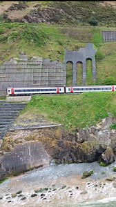28 reactions · 11 comments | This is a special rail journey. Have you done it? The Cambrian Coast line in Wales shown here as an unknown #class158 climbs south out of Fairbourne, heading towards Tywyn and Machynlleth. The single track hugs the cliffs, passing between the bird nest, threading between the rock fall protection arches. #CambrianCoastLine #cambriancoast #railwayvideos #transportforwales #ScenicRailways #scenictrainride | Wobbly Runner Exploring | Facebook
