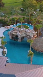 One of our most Insane Pool builds to date. This pool is over 200 thousand gallons and has a 150 foot lazy river and hot tub inside the grotto. What do you think? #insanepools #lucaslagoons #pool #poolbuilders #backyard #insane #lazyriver | Lucas Lagoons