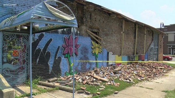 George Floyd mural in north Toledo reduced to rubble after being struck by lightning; mayor and artist say it will be replaced