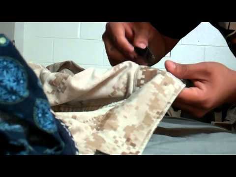 Getting ready for a uniform inspection. USMC